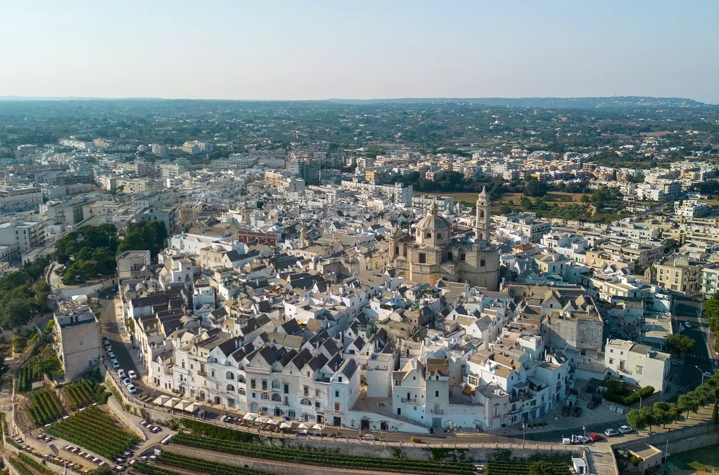 Aerial view of Locorotondo, the round white town of the Valle d'Itria