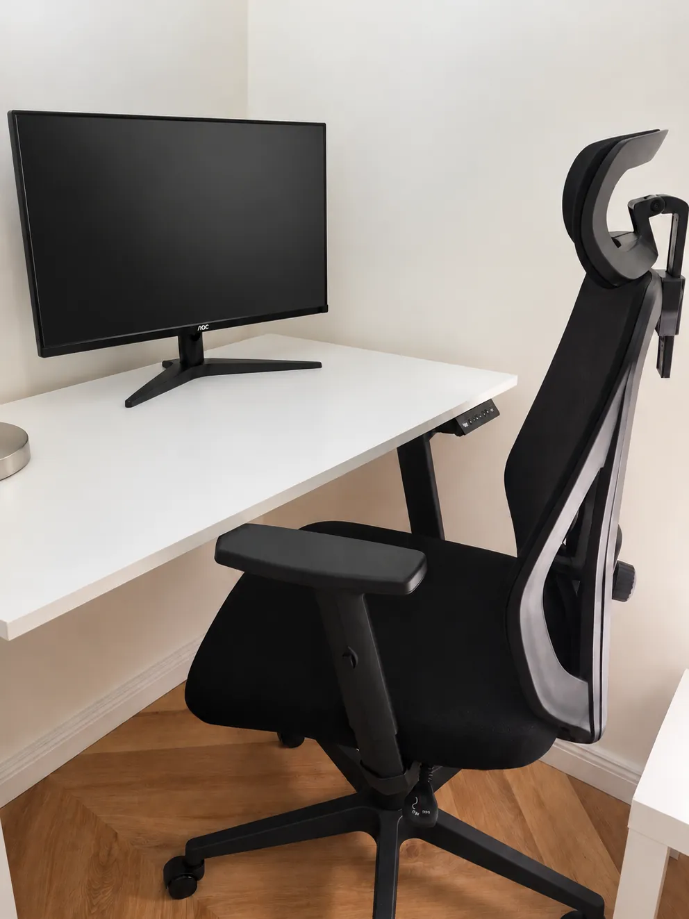 Work desk with a 27-inch monitor at BDS House